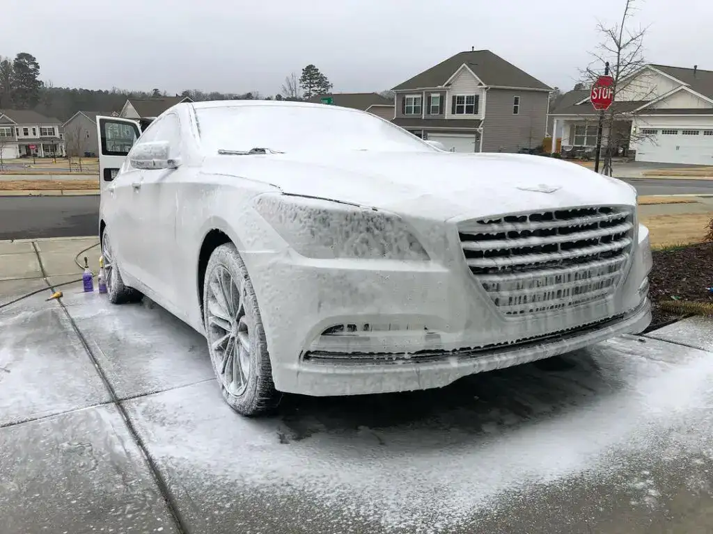 White car foamed up during a hand wash